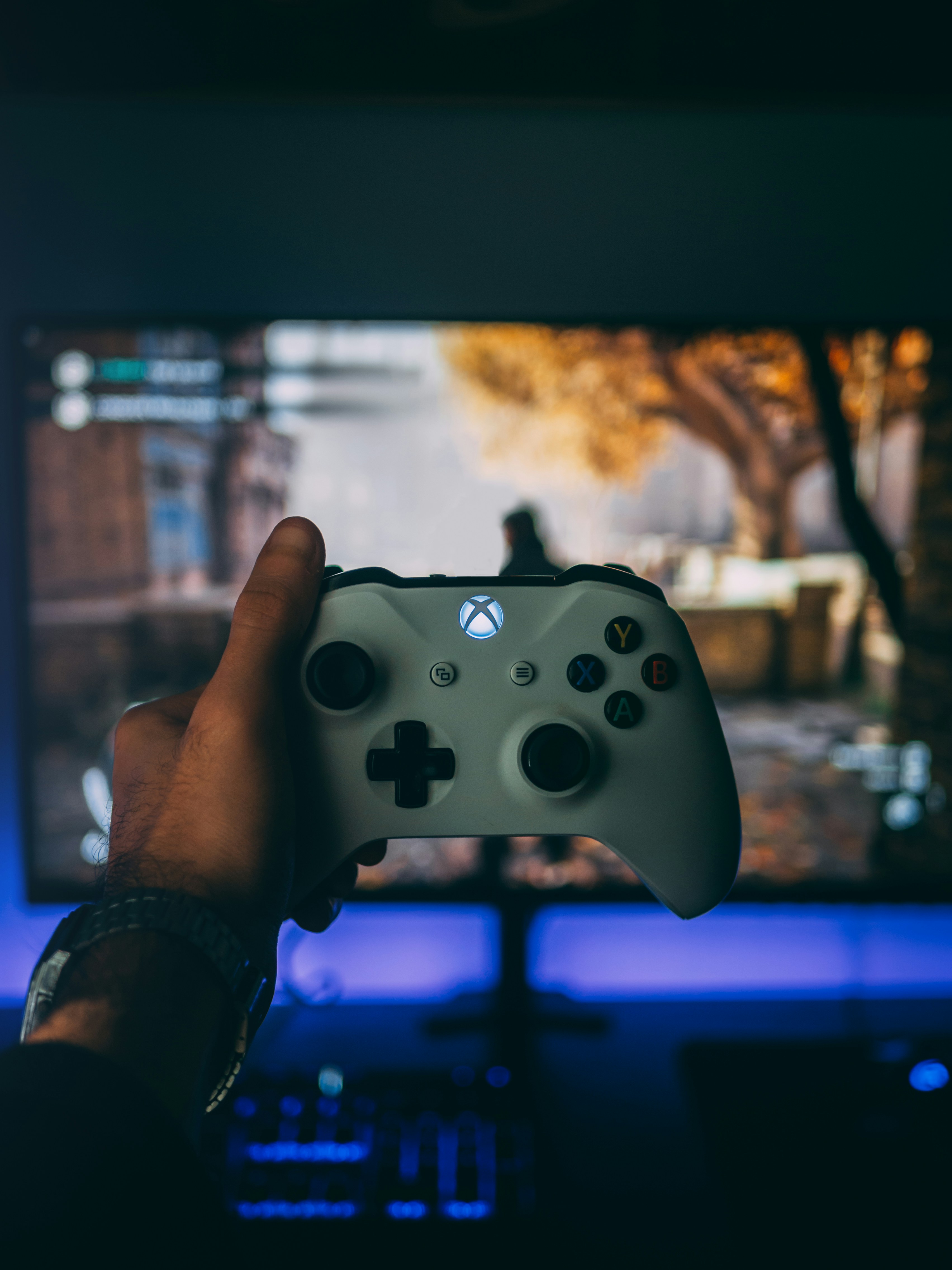 Xbox controller with ambient blue lighting